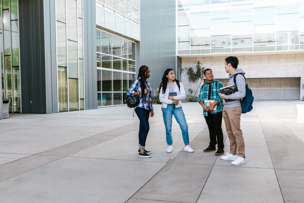 students on university campus (pexels, rdne stock project)
