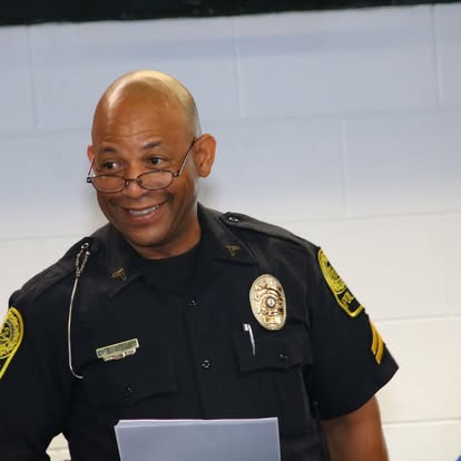 Smiling Hampton University police officer